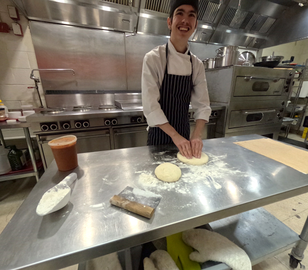 Getting pizza dough ready. Open Gallery